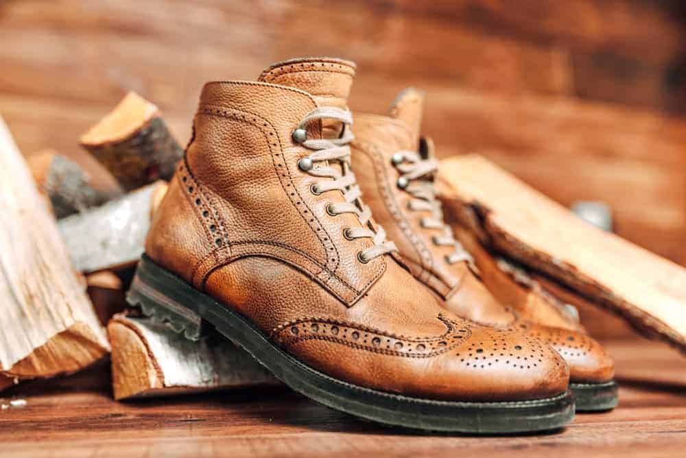 Balmoral boots on tree blocks and hardwood floor.