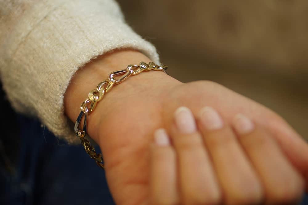 Woman hand with bracelet.