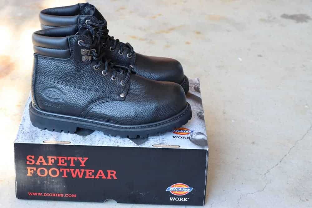Dickies steel toe work boots sitting on a box.
