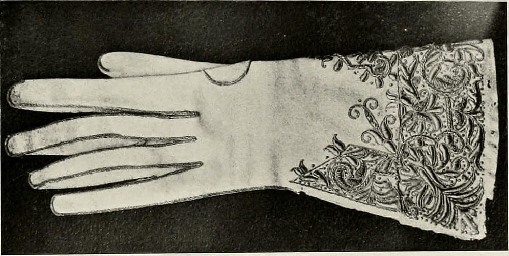 A close look at an embroidered glove.