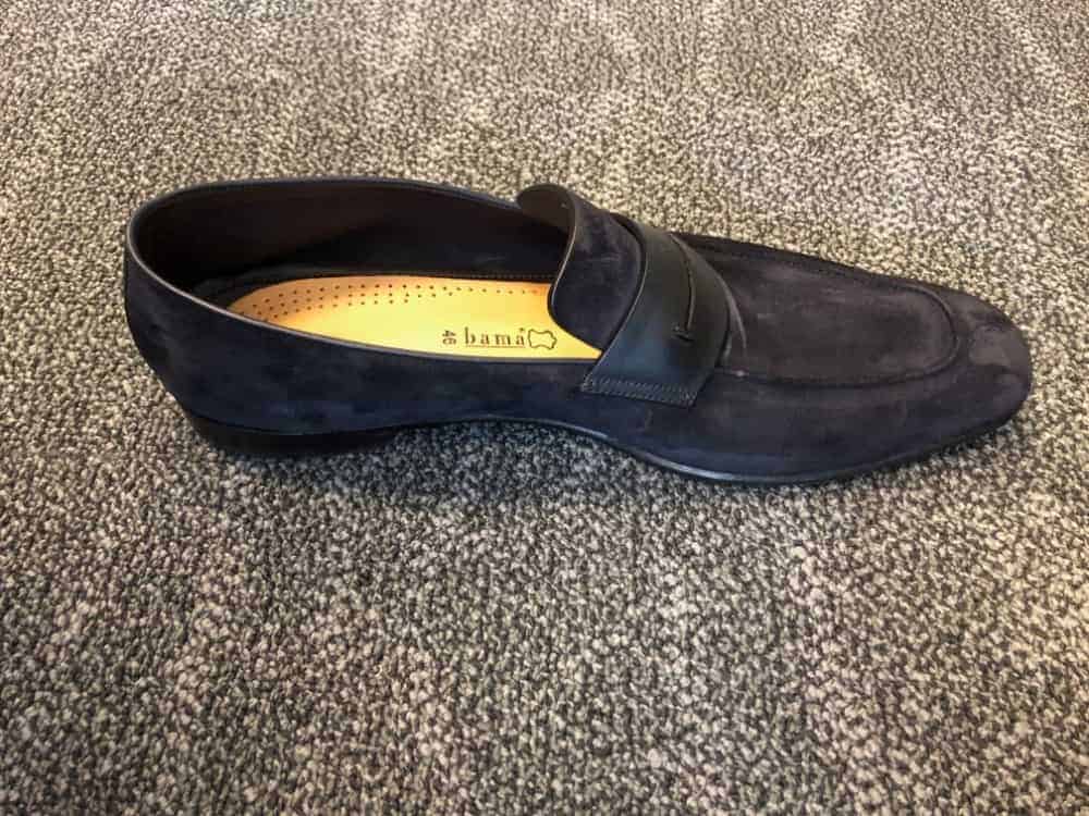 Side view of blue Zegna suede loafer.