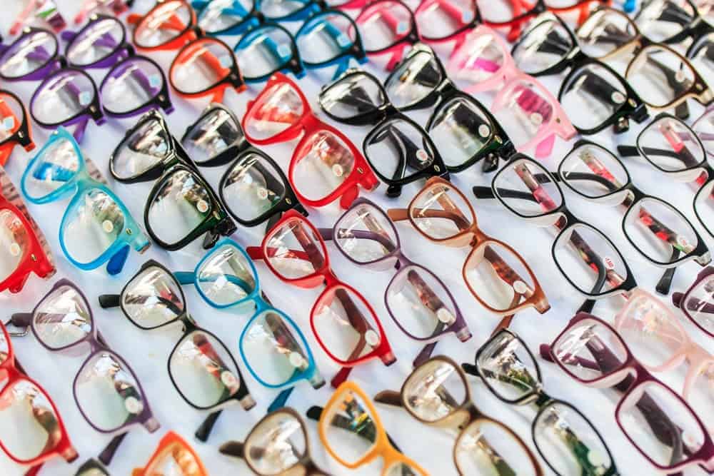 Various colorful glasses on display at a shop.