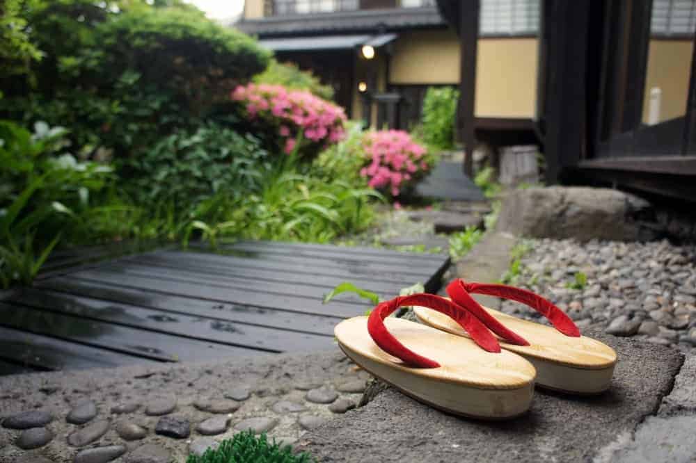 A pair of wooden Japanese sandals at a Japanese ryokan.