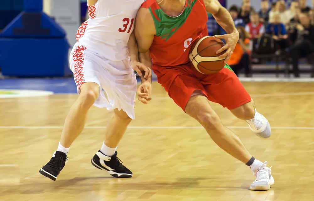Players during basketball match.