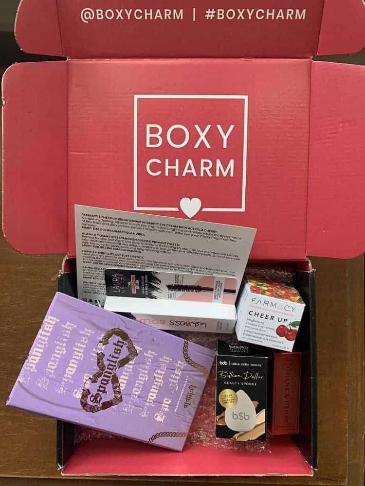 Boxy Charm beauty box filled with various beauty products.