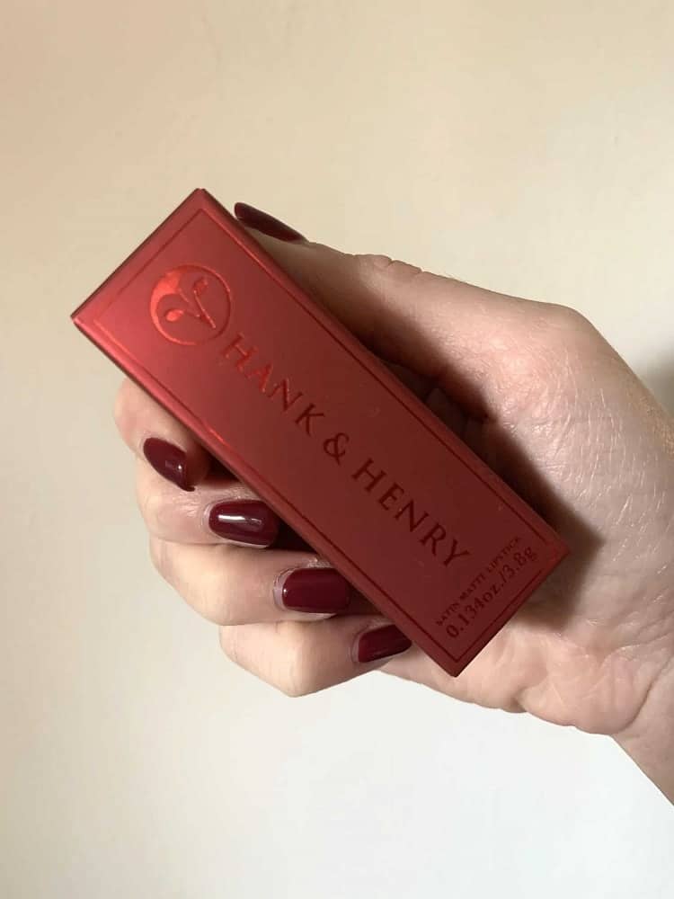 A closeup look at a box of Hank and Henry satin matte lipstick.