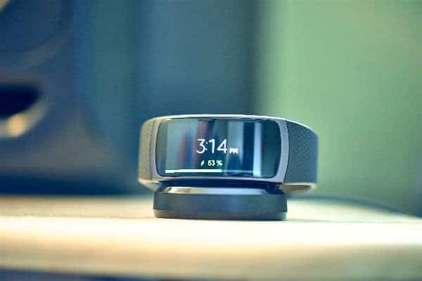 A close look at the Samsung Gear Fit 2 Smartwatch while charging.
