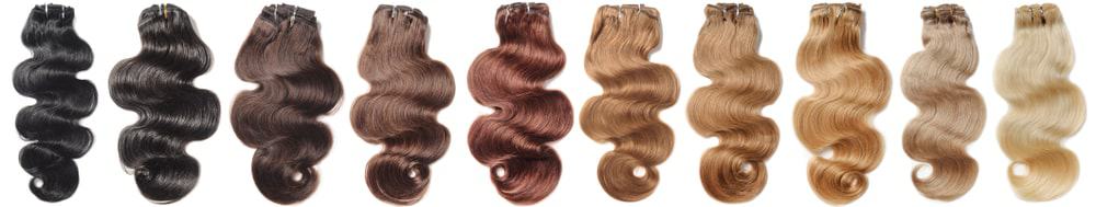 A line of clip-in hair extensions in different colors.