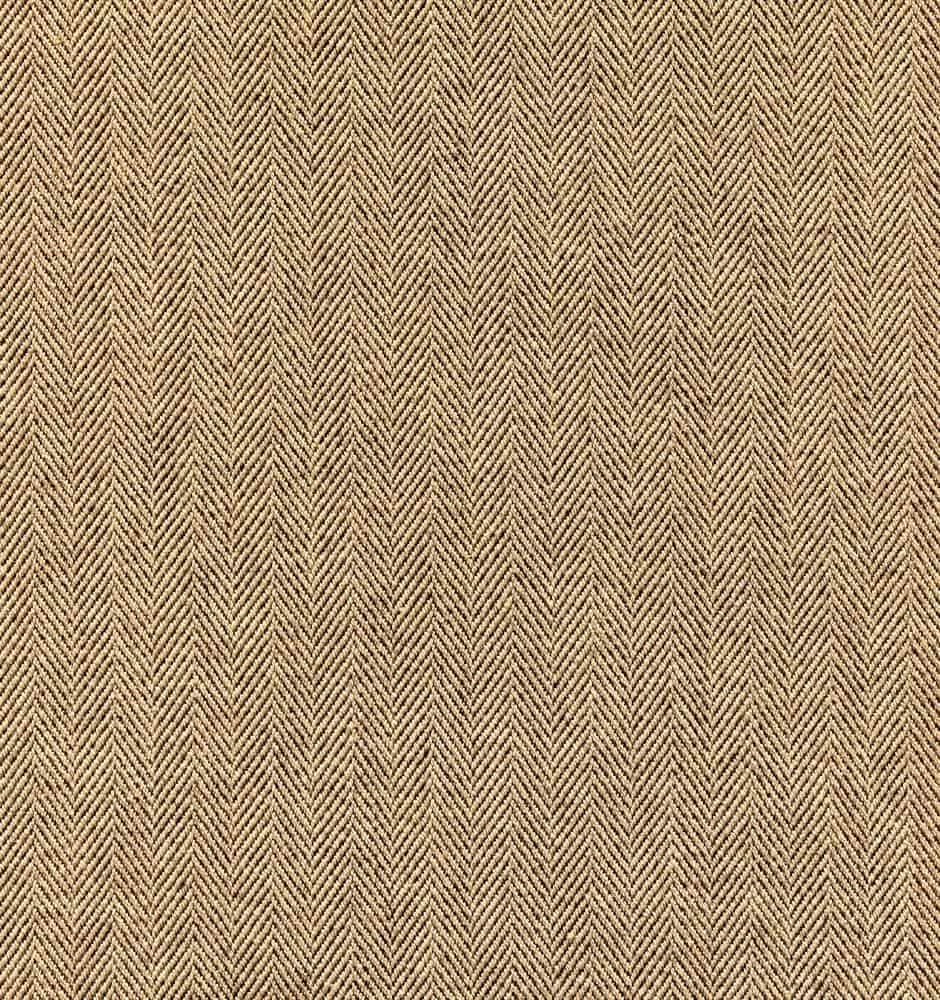 A close look at a beige cotton twill pattern.