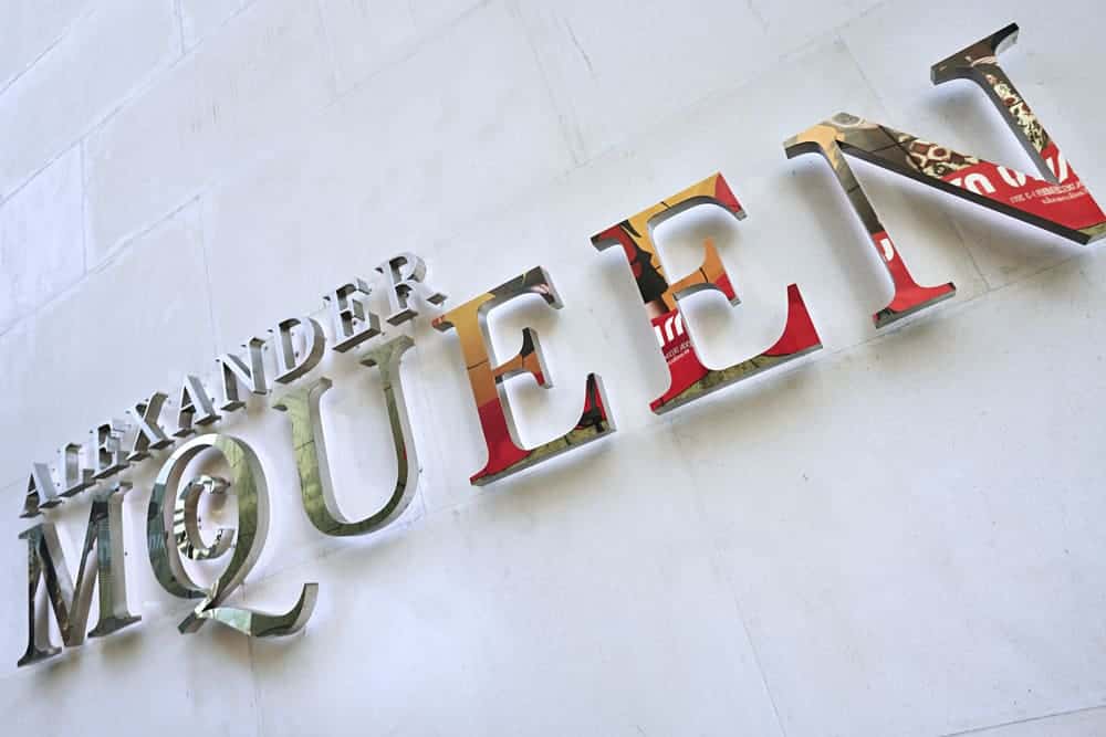 Alexander McQueen logo on fashion store.