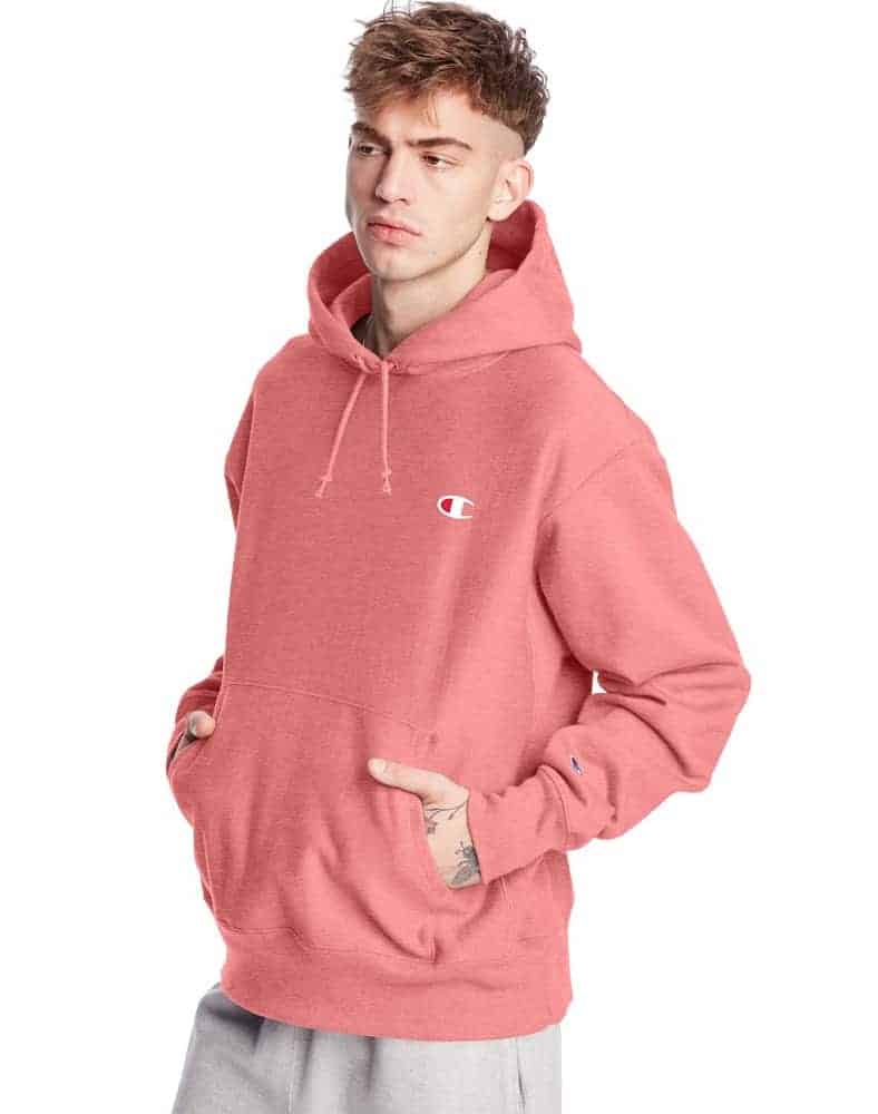 The Champion Reverse Weave Hoodie in salmon pink.