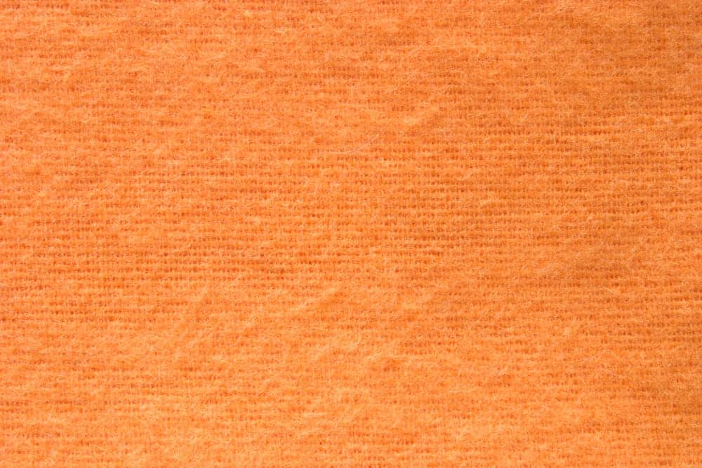 Orange fabric with flannel texture.