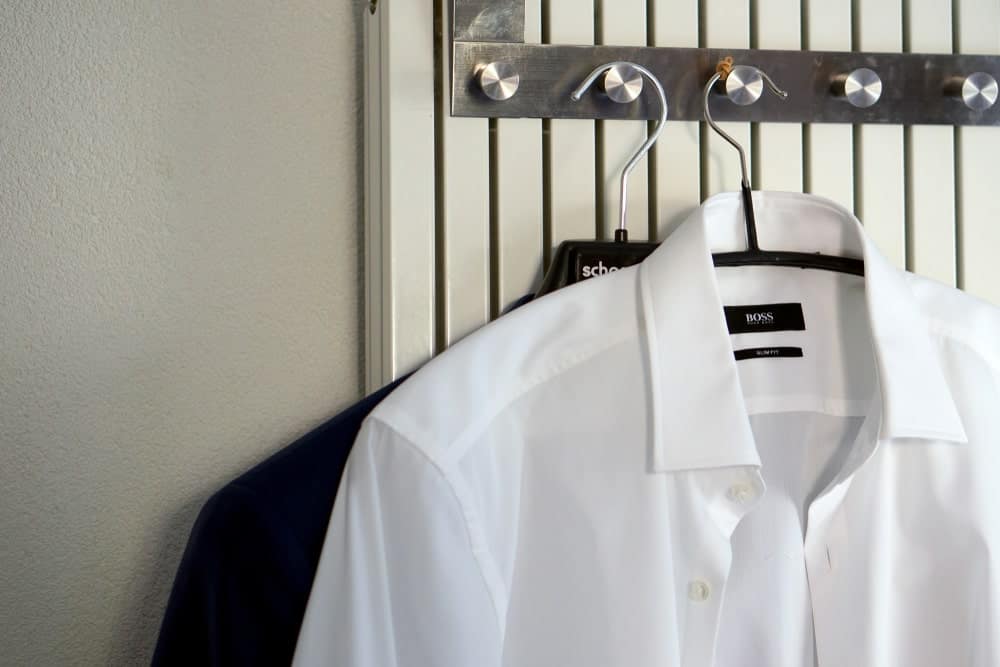This is a close look at a couple of Hugo Boss shirts in hangers.