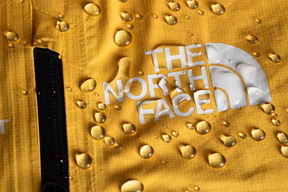 Waterproof The North Face jacket in yellow.