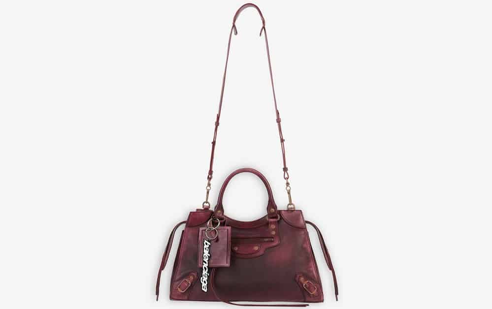 The Balenciaga Neo Classic Top Handle Bag in burgundy.