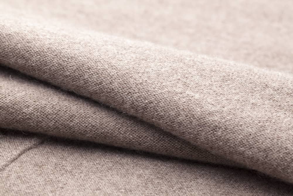 This is a close look at a brown Wool fabric.