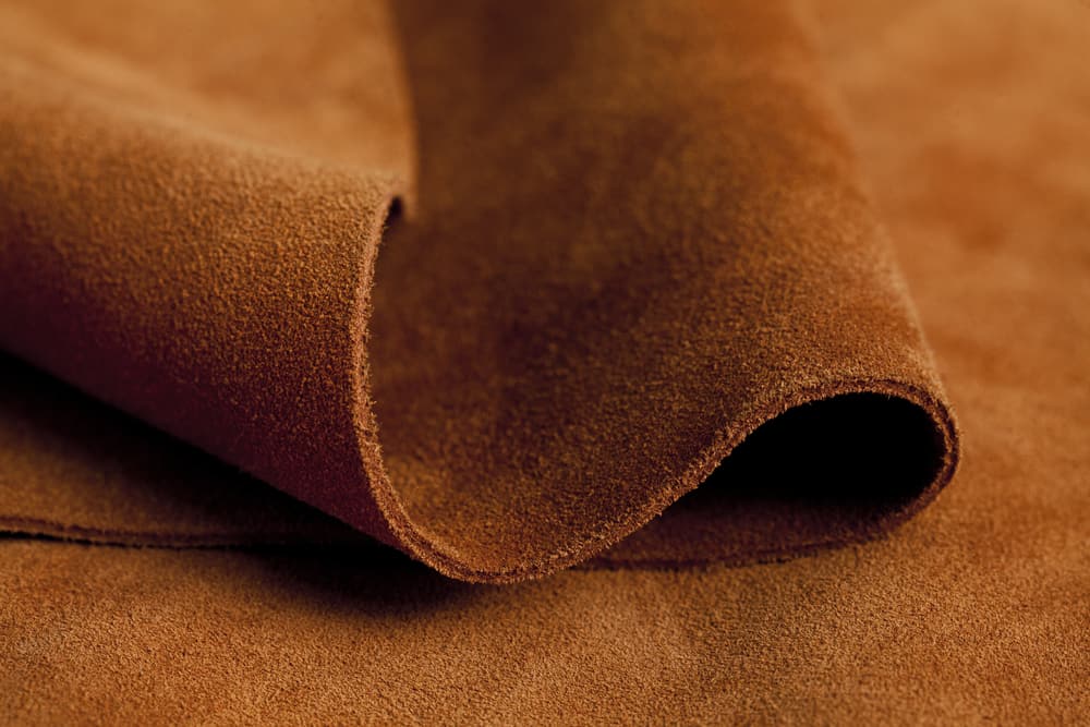 This is a close look at a brown leather fabric.