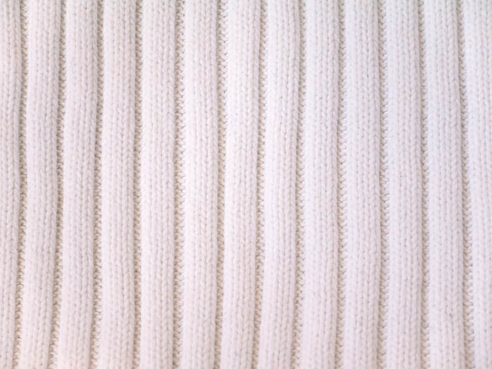This is a close look at a beige Rib Knit fabric.