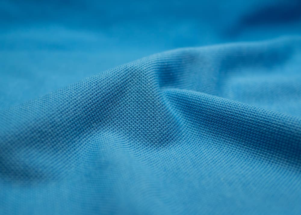 This is a close look at a blue Pique fabric.