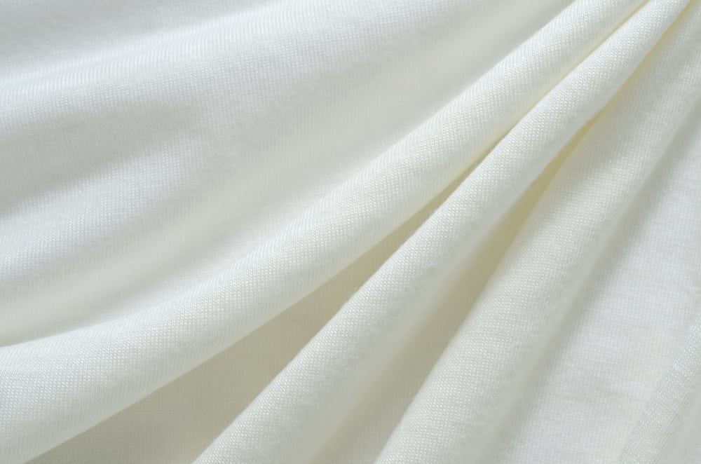 This is a close look at a white cotton fabric.