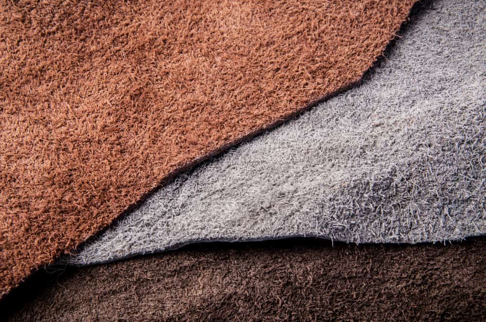 This is a close look at three types of leather with different tones.