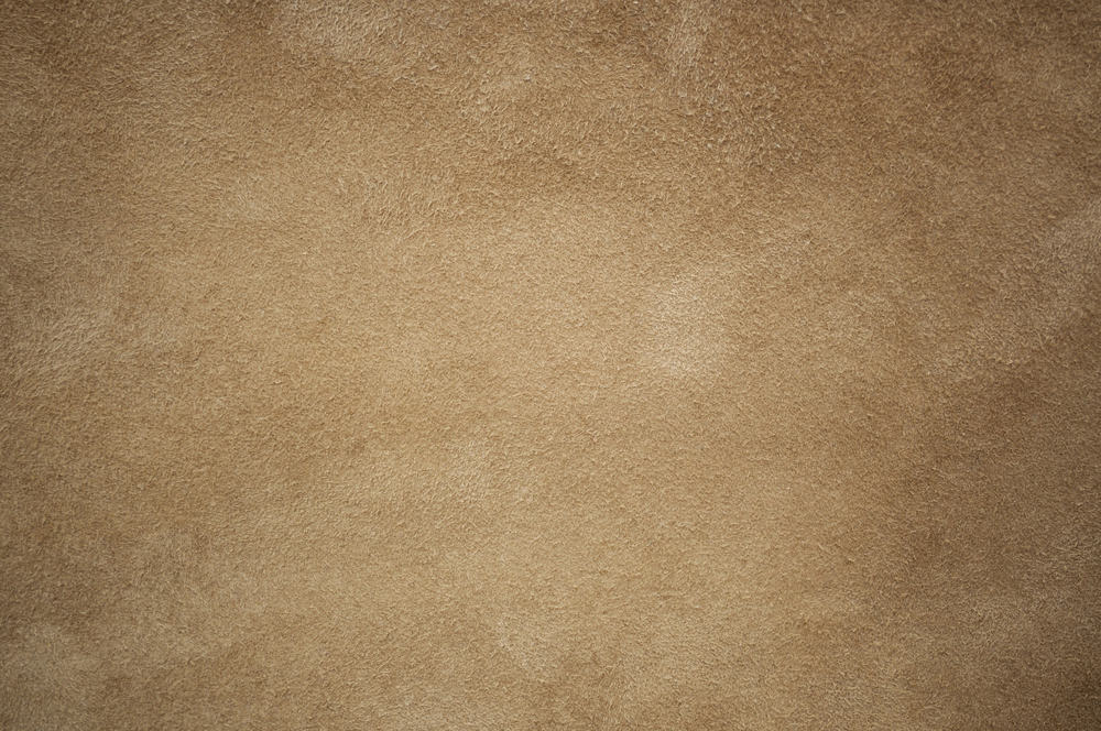 This is a close look at a piece of brown Chamois leather fabric.