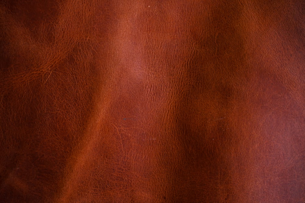 This is a close look at a piece of brown Vegetable Tanned Leather fabric.