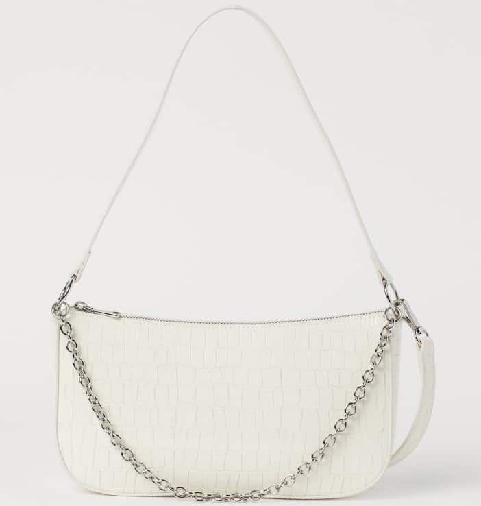 The white small hand bag from H and M.