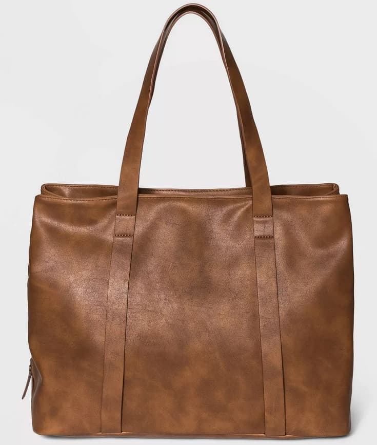 The brown leather triple compartment tote handbag from Target.
