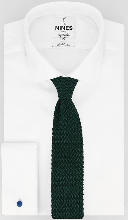 This is the dark green knit tie from The Nines.