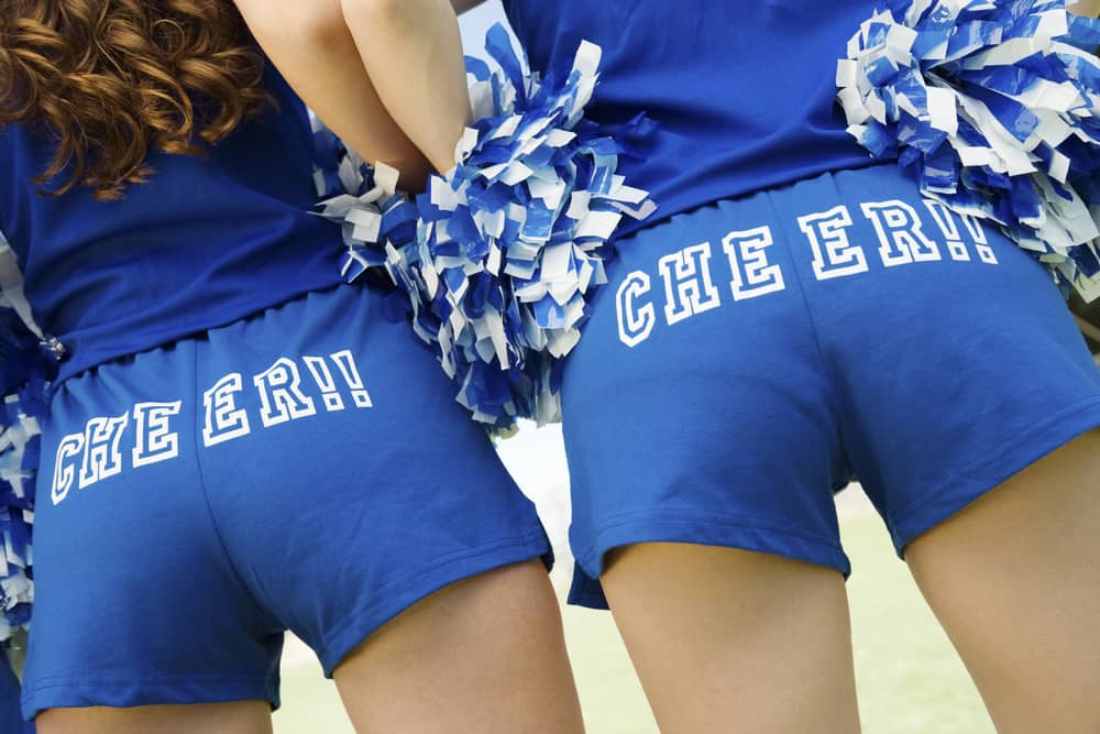 This is a close look at a couple of cheer leaders wearing the same soffe shorts.