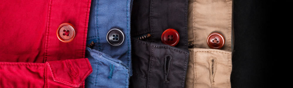 This is a close look at various twill shorts showcasing the buttons.