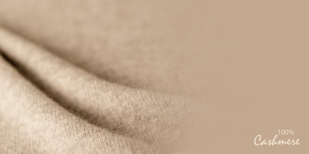 This is a close look at a beige 100% cashmere cloth.
