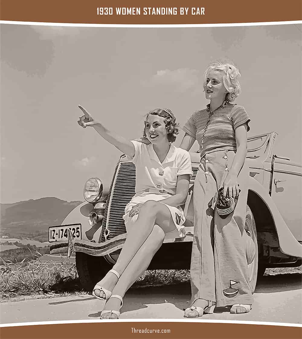 Women standing by car in 1930.