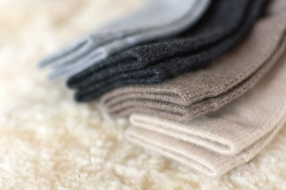This is a close look at pairs of neutral-toned cashmere socks.