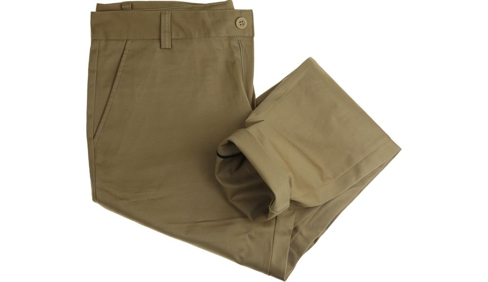 A close look at a pair of green chino pants.