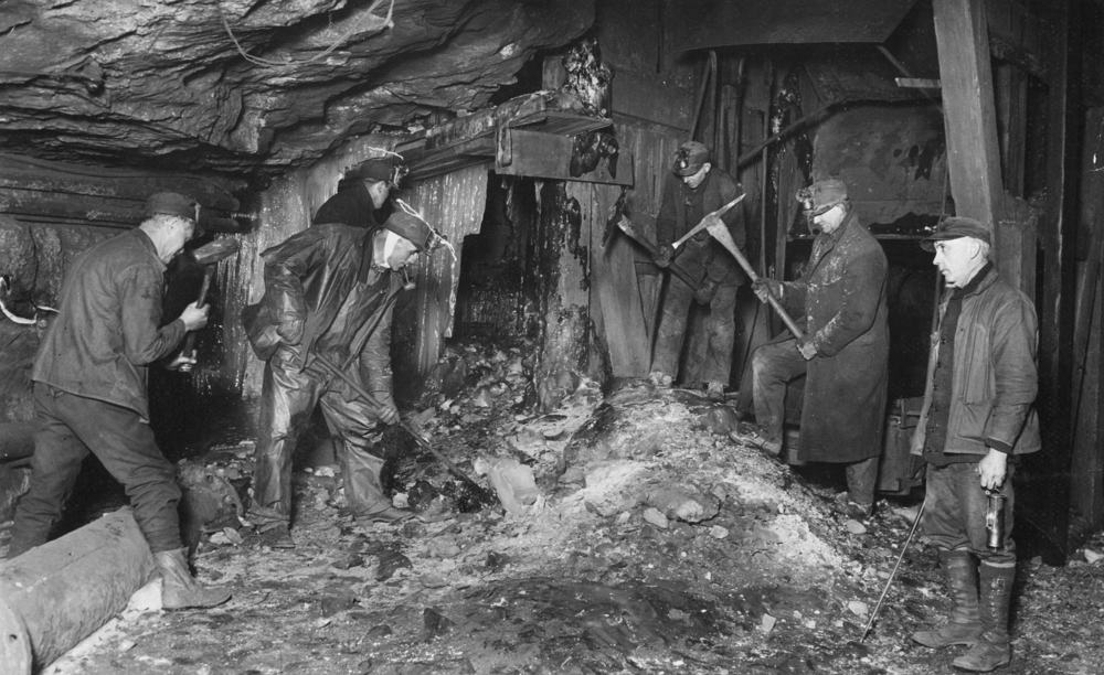 Coal miners wearing cotton pants.