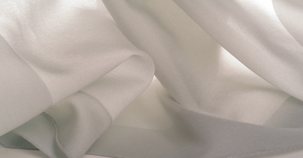 This is a close look at a white dupioni silk cloth.