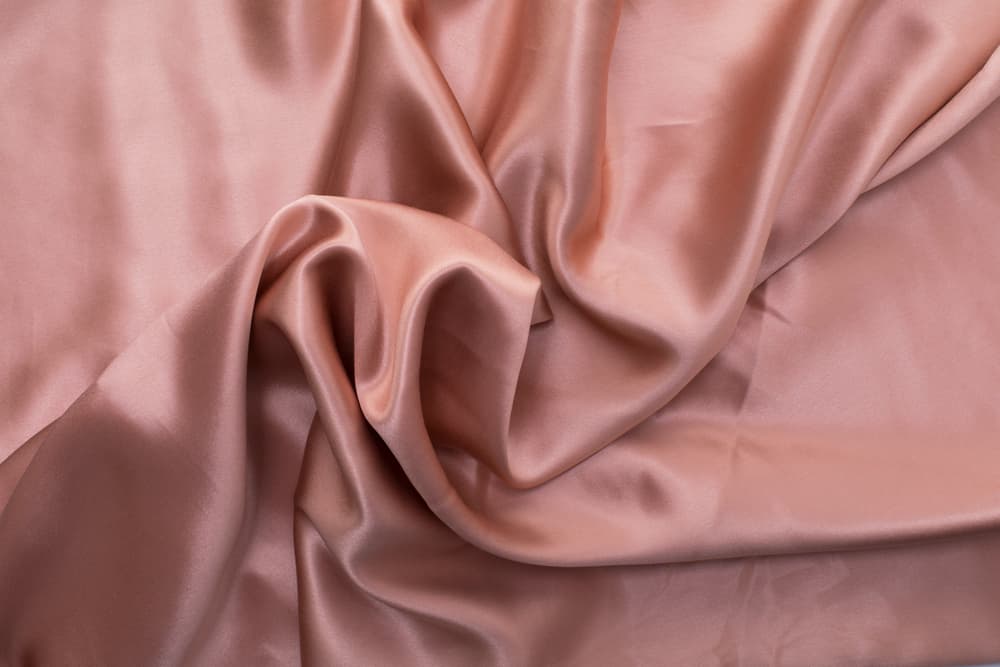 This is a close look at a pink crumpled Mulberry Silk.