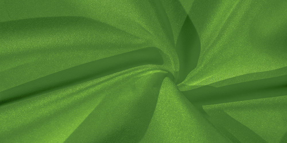 This is a close look at a piece of green crepe silk.