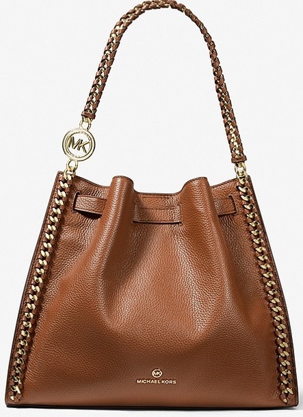 The Mina Large Pebbled Leather Shoulder Bag in brown leather by Michael Kors.