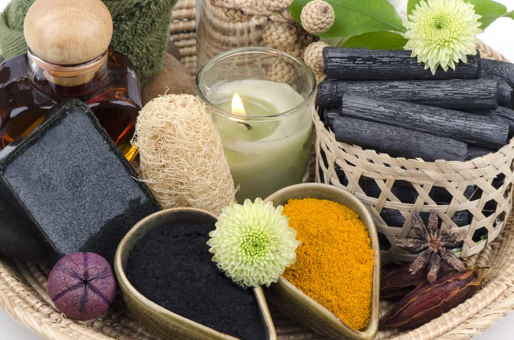 This is a close look at various charcoal bath products on a basket.