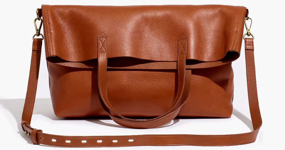 The Foldover Transport Tote in brown leather by Madewell.