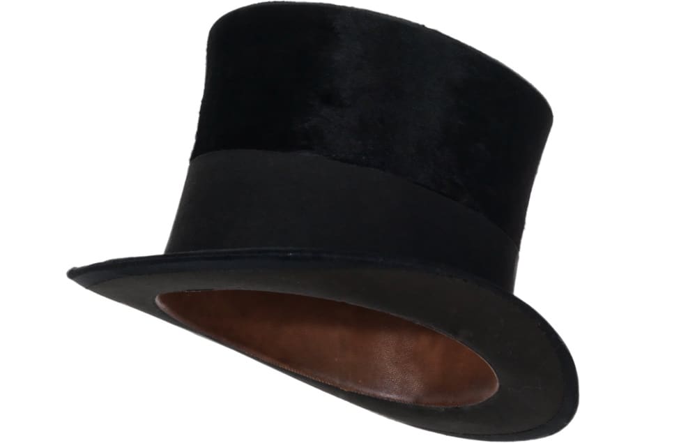 This is a close look at a vintage felt black top hat.