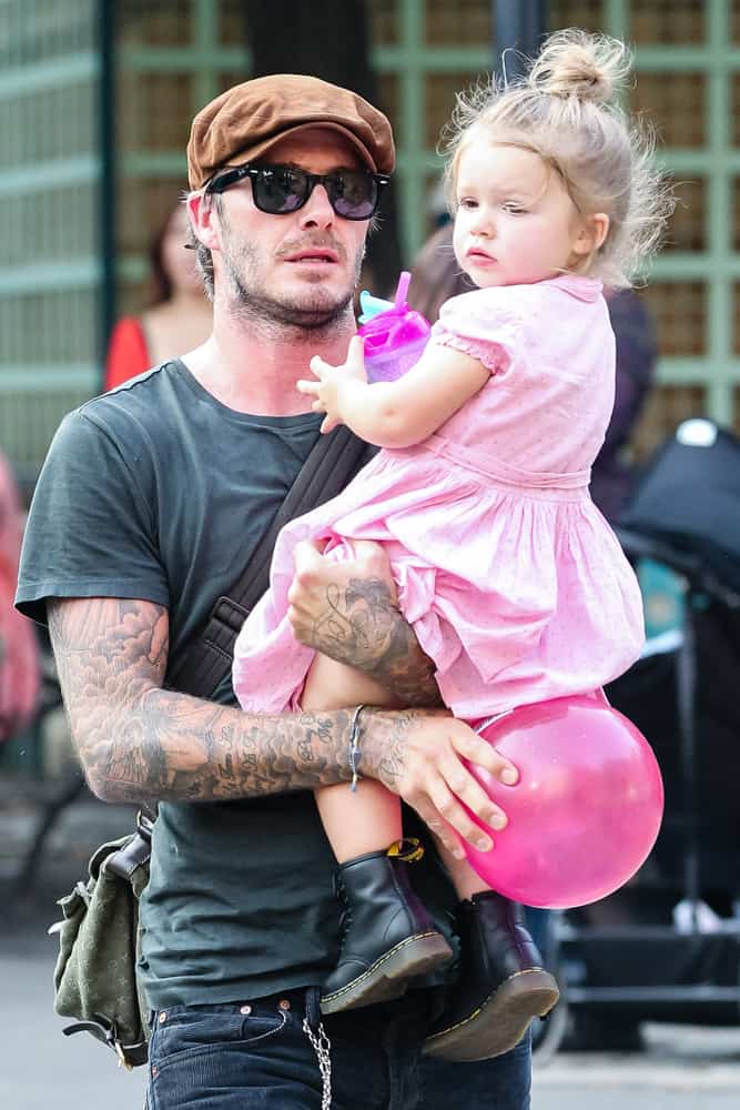 David Beckham was walking the streets of New York back in 2013 with his daughter while wearing an ivy cap.