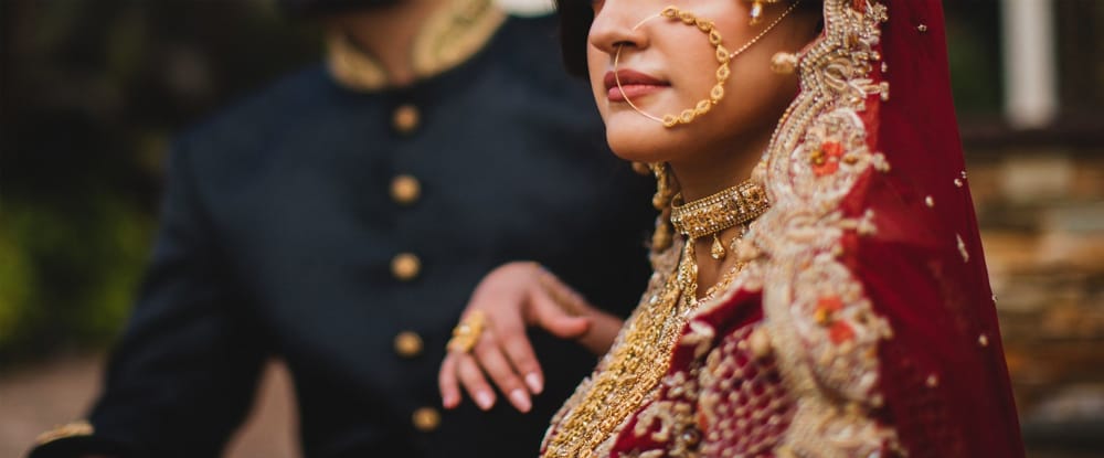 Pakistani Indian bride wearing nose ring.