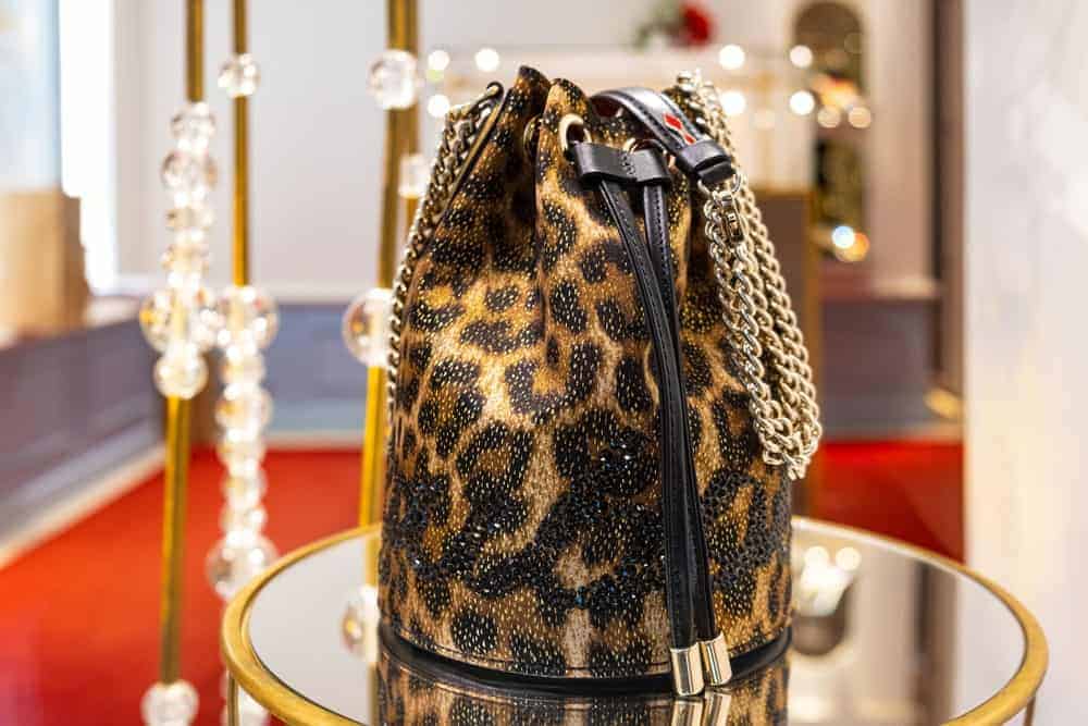 Leopard bucket bag at Louboutin store.