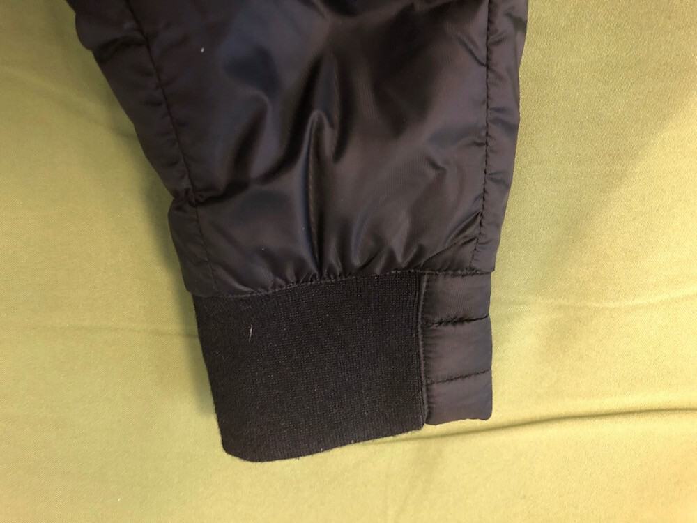 Close up of cuff on Canada Goose puffer jacket.
