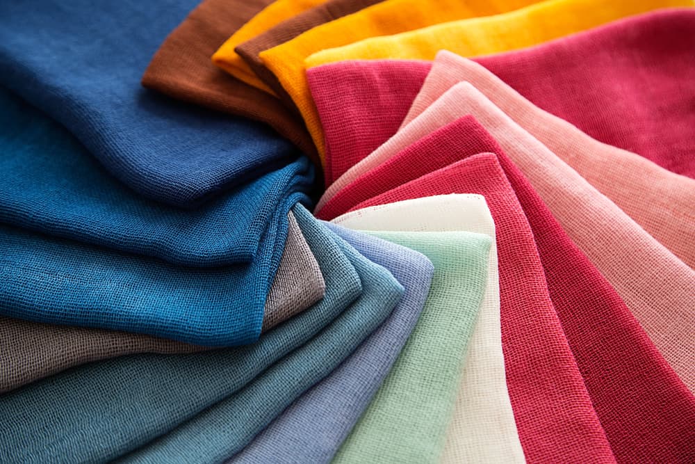 A group of twisted colored fabrics