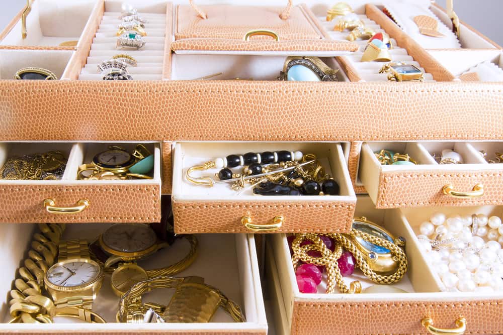 Various jewelry in jewelry boxes.